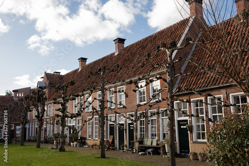 residences in the Sint Anthony Gasthuis in Groningen Netherlands. small community of social housing in city center called a hof in Dutch for people to live. BnB on site and protected walled design  photo