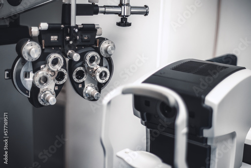 A phoropter commonly used in optometry practices is in selective focus and shows a clear insight into the meticulous nature of an ophthalmologist's work; in shallow depth of field photo