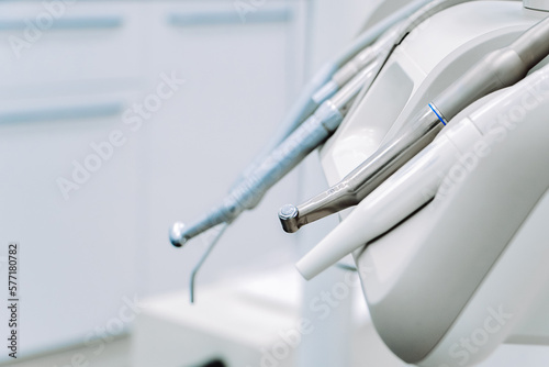 Modern dental equipment in dentist clinic. Dentists tools for treatment and surgery of teeth.