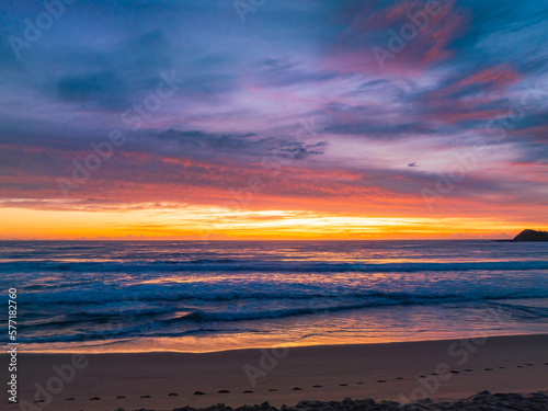 Sensational high cloud sunrise at the seaside