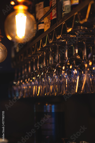 Glasses hanging from bar