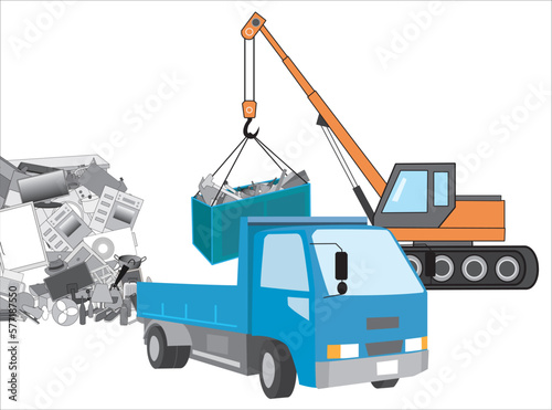 ゴミ処理施設で重機を使って作業している。