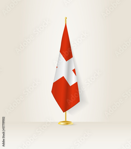 Switzerland flag on a flag stand.