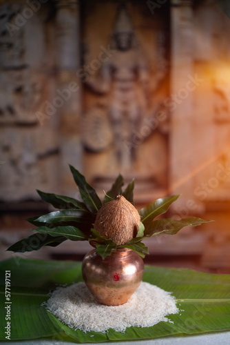 Kalash with coconut on white rice  photo
