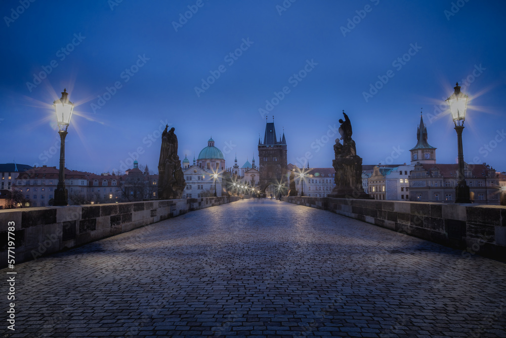 Charles Bridge, Prague at dramatic evening, Czech Republic, with night lighting