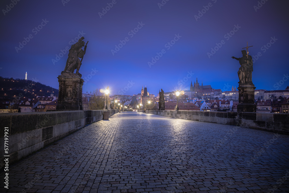 Charles Bridge, Prague at dramatic evening, Czech Republic, with night lighting