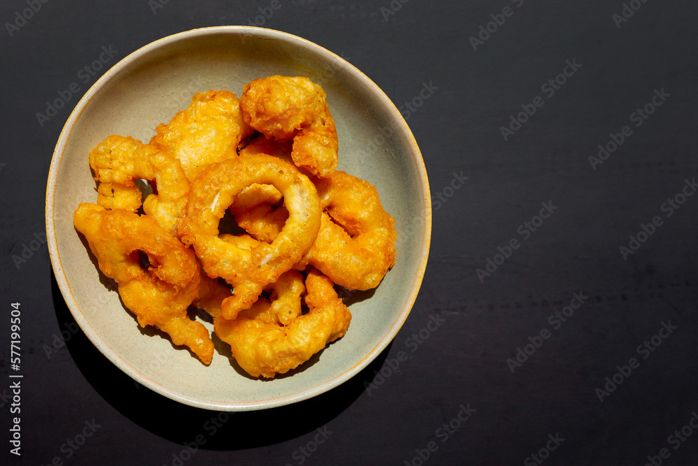 Fried squid in bowl. Top view
