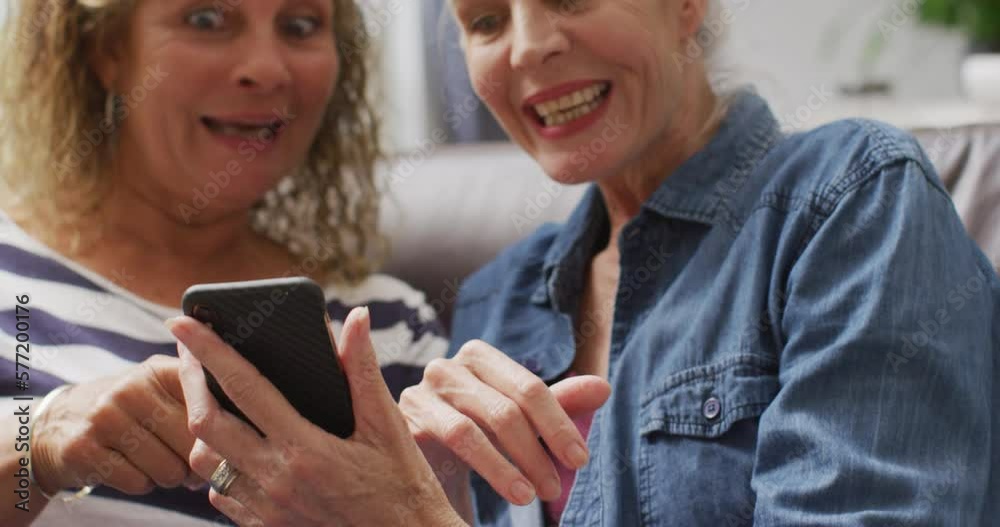 Animation of happy diverse female senior friends using smartphone Animation of happy diverse female senior friends using smartphone