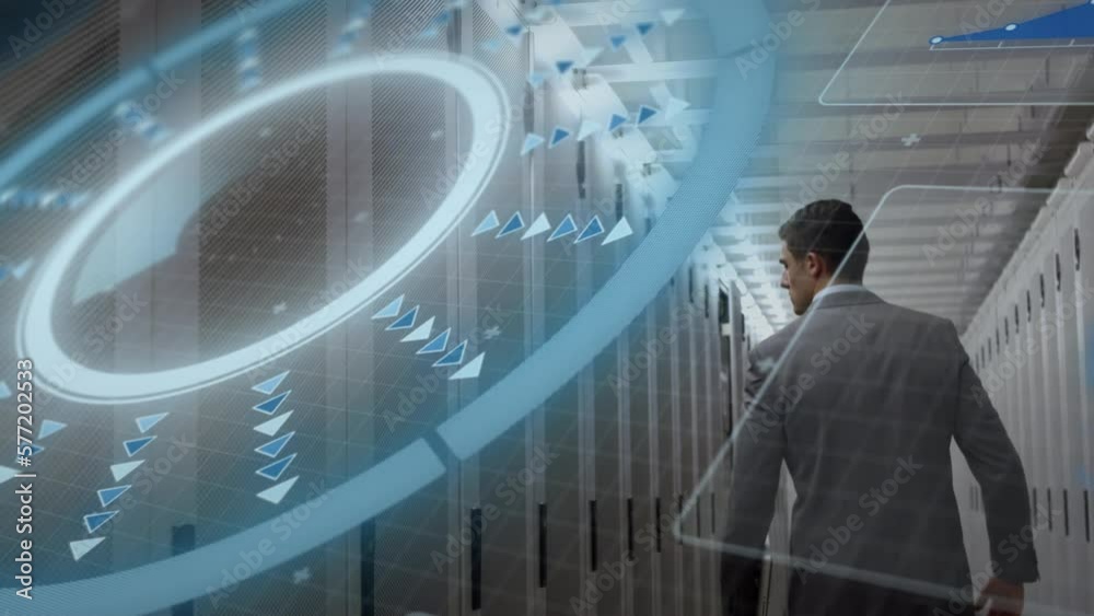 Animation of scanner processing data over caucasian businessman walking through server room Animation of scanner processing data over caucasian businessman walking through server room