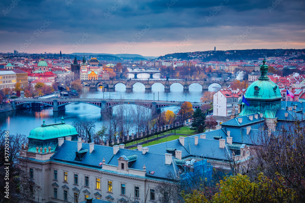 Panoramic view over the cityscape of Prague at dramatic dusk, Czech Republic