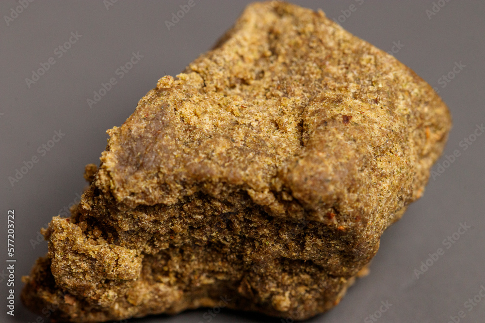 Detail of medical marijuana extraction hash cannabis pollen hashish, texture closeup