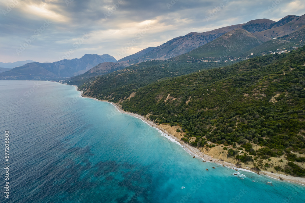Aerial view of green shore with huge rocks by Bunec Beach area in Summer 2022, Albania Aerial view of green shore with huge rocks by Bunec Beach area in Summer 2022, Albania