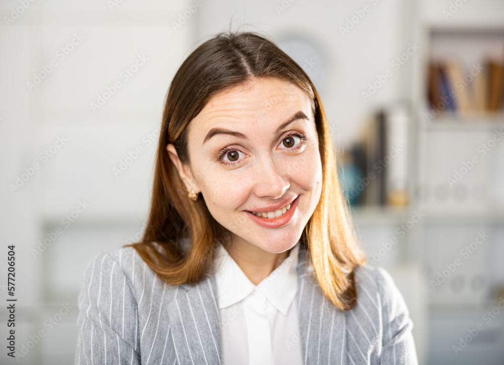 Business woman expresses different emotions while working in the office