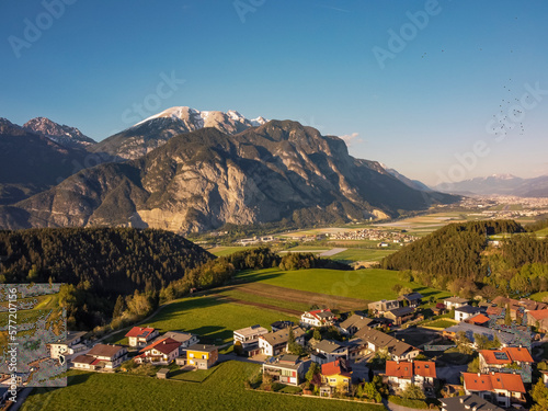 Aerial view Oberperfuss town in Tirol Austria by drone. Alps mountains. photo