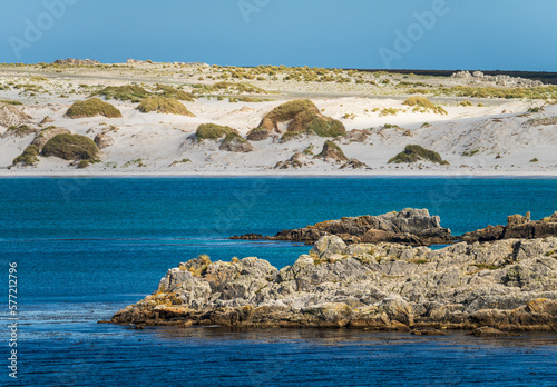 Bild auf Leinwand Sandy beaches and rocks when approaching the port of Stanley on the Falkland Isl