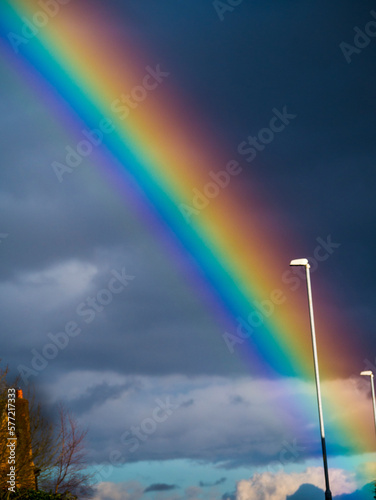 Lancashire in England is one of the wettest places in the country and rainbows are a frequent weather feature. This rainbow is above Burnley near to Pendle Hill photo