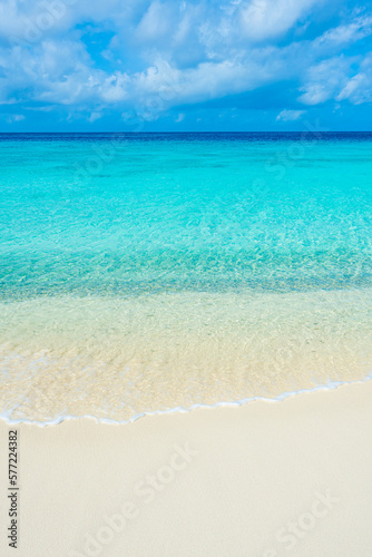 white sand beach with turquoise water in Carribbean