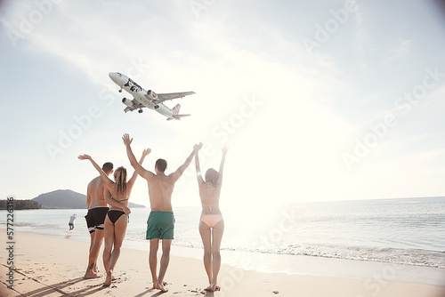 Billede på lærred airplane view  beach and  group of people meet, the concept of freedom vacation,
