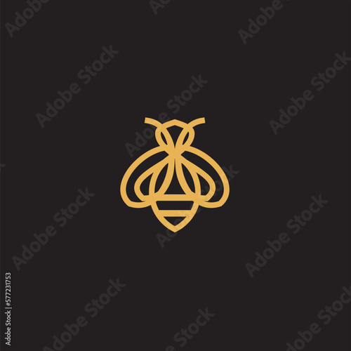 Bee logo shaped with lines forming a flying bee into the design, creating a bee logo in gold color.