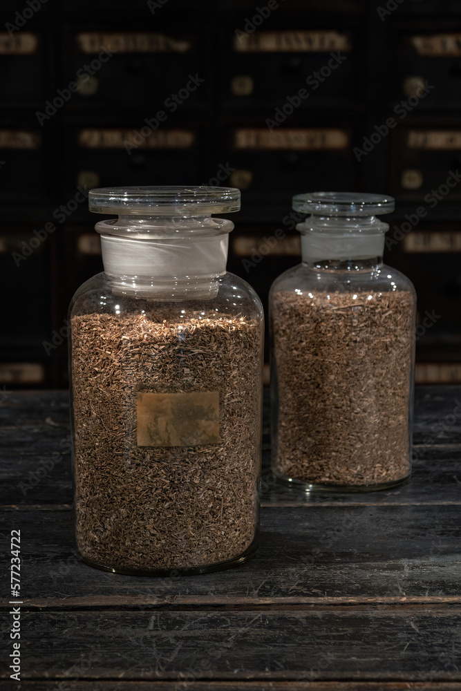 Dried herbs in a glass jar. Dried herbs in a glass jar.