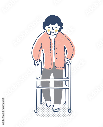 歩行器を使って歩くシニア女性