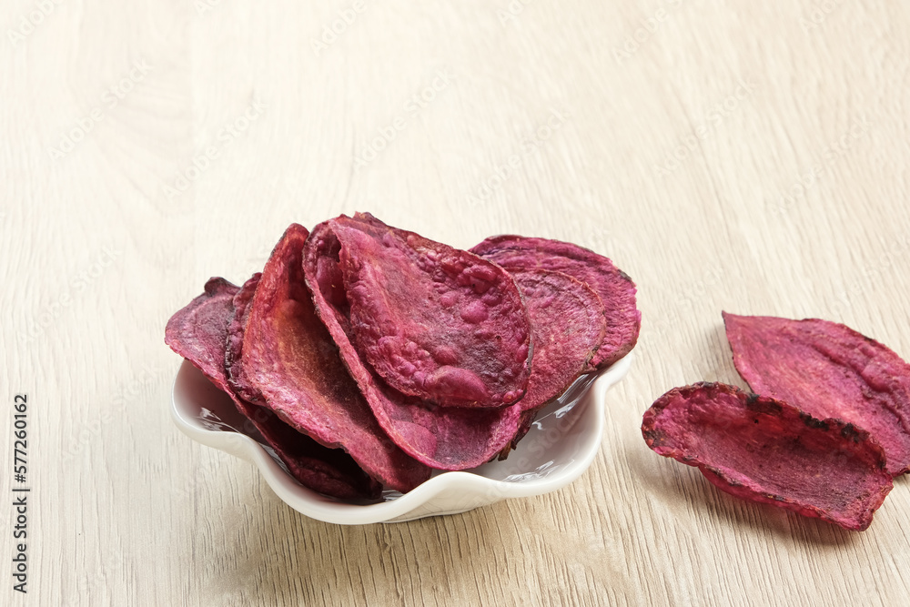 Fototapeta premium Keripik Ubi Ungu or Sweet Potato Chips, Indonesian traditional snack.