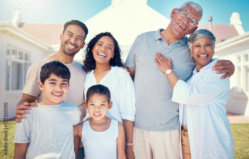 Happy, smile and portrait of big family at new home for bonding, affectionate and care. Relax, quality time and natural with parents and children in garden for happiness, generations and support