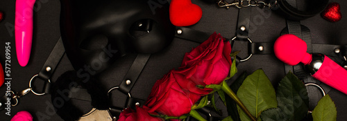 Foto Various sex toys set on a black background