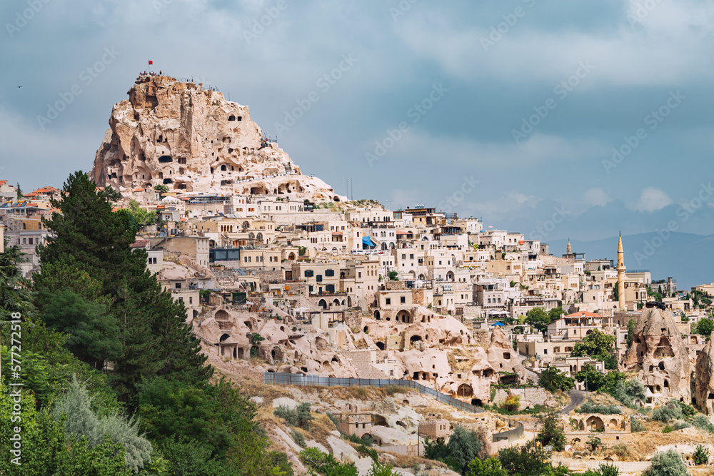 The breathtaking panoramic view of Cappadocia's Pigeon Valley and the majestic Uchisar Castle makes the perfect postcard.