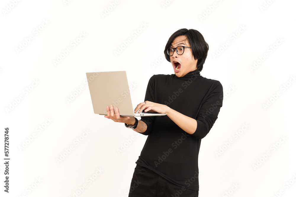 Shock and Angry While Using Laptop Of Handsome Asian Man Isolated On White Background Shock and Angry While Using Laptop Of Handsome Asian Man Isolated On White Background