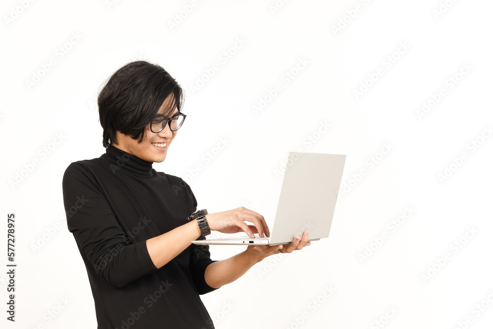 Standing and Using Laptop Of Handsome Asian Man Isolated On White Background Standing and Using Laptop Of Handsome Asian Man Isolated On White Background