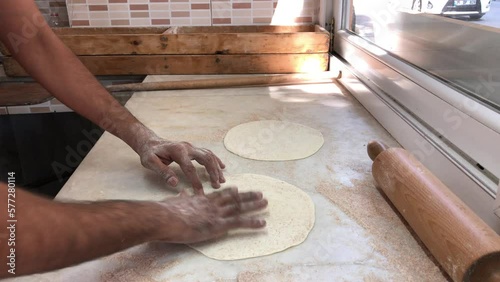 Turkish pide maker, pastry handmade, opening dough for baklava pide