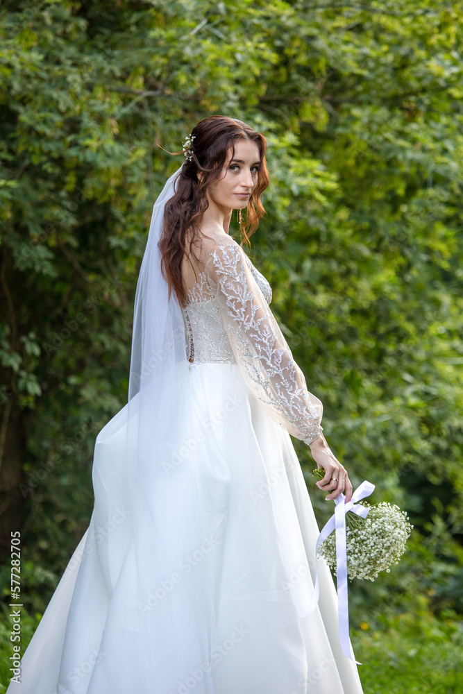 Portrait of a girl in a wedding dress