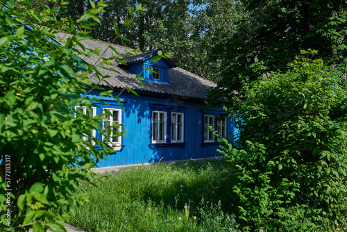 Obraz na płótnie Blue wooden house of