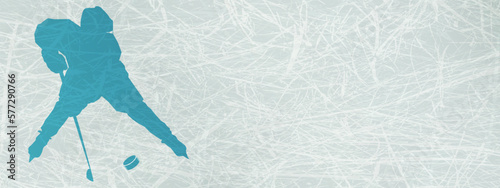 Hockey background with a silhouette of a child hockey player with a stick and a puck in a calm blue tint on a ice horizontal template. Sports illustration with space for text, promotions, advertising,
