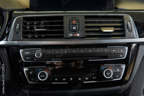 car climate control unit and heated seats. deflectors of the car ventilation system, door lock button and alarm
