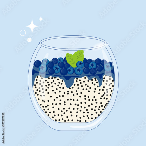 Chia seed pudding in glass with fresh blueberries and jam layer. Healthy superfood breakfast, fruit parfait dessert