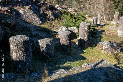 Granite roman milestones in Via XVIII, Roman road between Braga and Astorga. Baixa Limia-Serra do Xures Natural Park Galicia, Spain photo