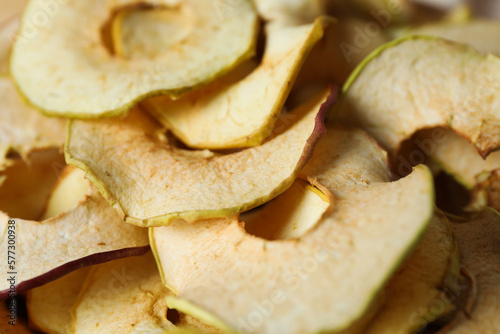 Concept of tasty food, dried apple chips