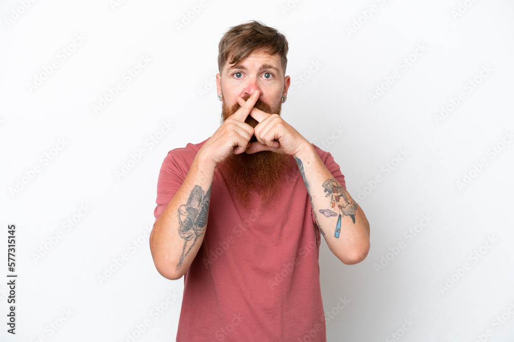 Redhead man with long beard isolated on white background showing a sign of silence gesture Redhead man with long beard isolated on white background showing a sign of silence gesture