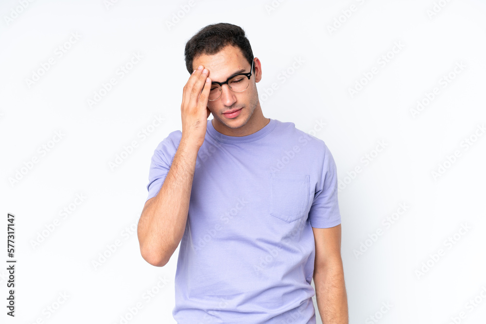 Young caucasian man isolated on white background with headache Young caucasian man isolated on white background with headache