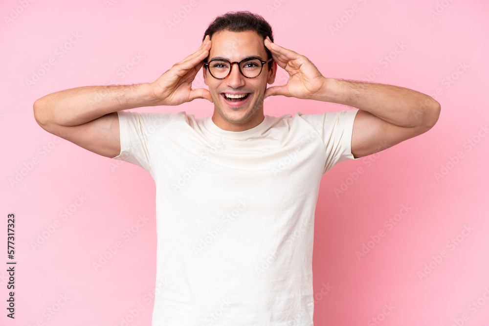 Young caucasian man isolated on pink background with surprise expression Young caucasian man isolated on pink background with surprise expression