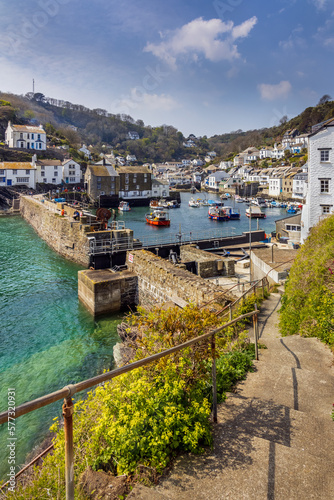 The entrance to the historic fishing harbour of Polperro on a beautiful summer day, Cornwall, England, Uk. photo
