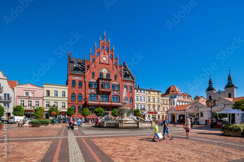 Town Hall and old tenement houses in the market square, Chojnice, Pomeranian Voivodeship, Poland.