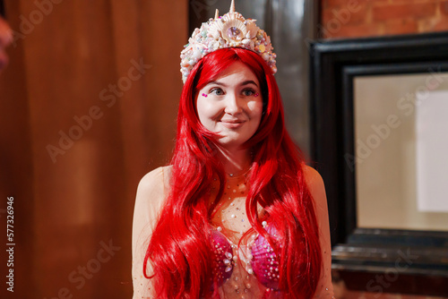 actors in costumes of a mermaid at a children's party.  photo