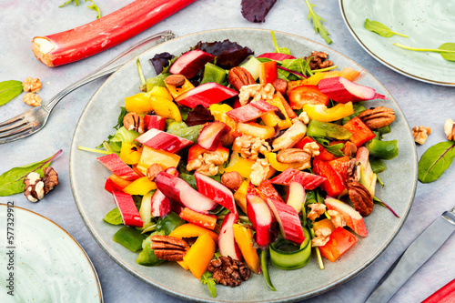 Delicious salad with rhubarb, herbs and nuts.