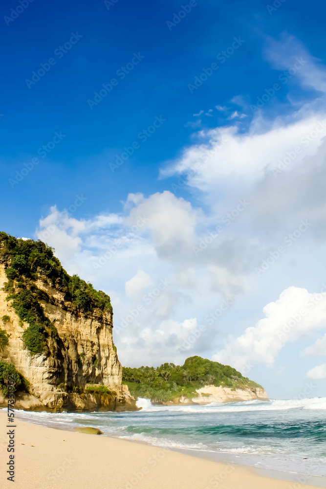 Fototapeta premium Tropical paradise beach with white sand and cliffs and blue sky with clouds on Sunny day. Summer tropical landscape, panoramic view. travel tourism wide panorama background concept. 