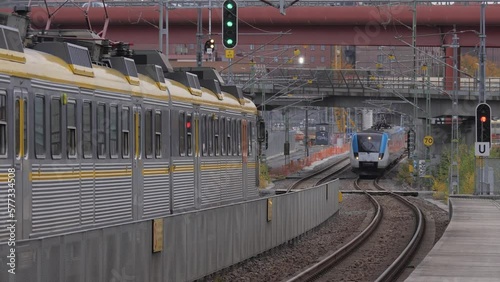 Commuter Train Departing and Arriving at Gamlestaden Train Station, Gothenburg