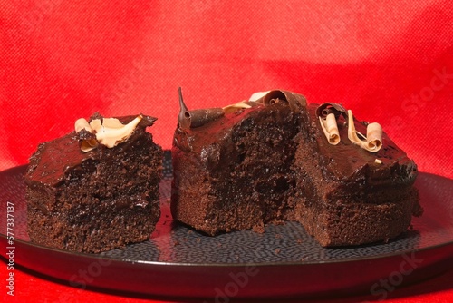 Chocolate Cake on a plate with red background