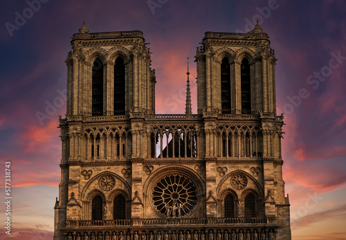 Notre Dame against sunset sky. Medieval Catholic Cathedral (Notre-Dame de Paris). European and world architecture heritage. Paris. France